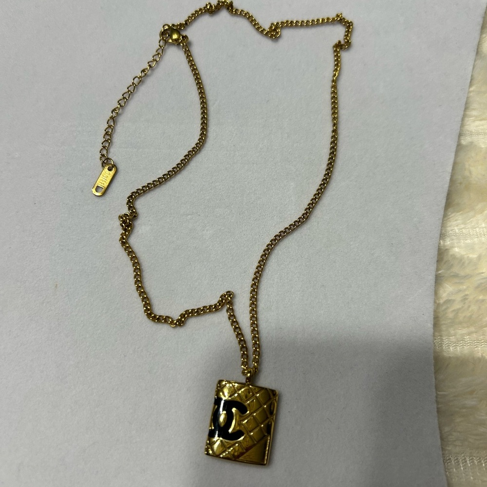 Gold Pendant Necklace with Black Detail
